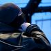 A member of the Washtenaw County Dive Team zips up a wet suit before the Ford Lake Frozen Leap on Saturday, Feb. 16. Daniel Brenner I AnnArbor.com